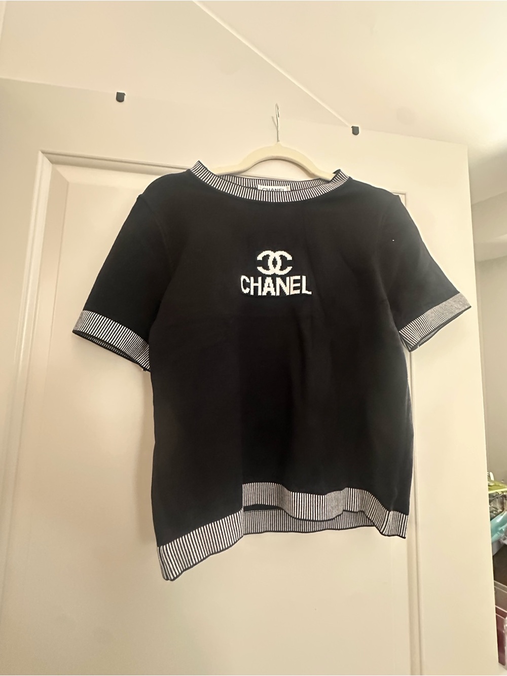 FASHION INSPO Black Crewneck Sweater with White Logo and Stripe Trim